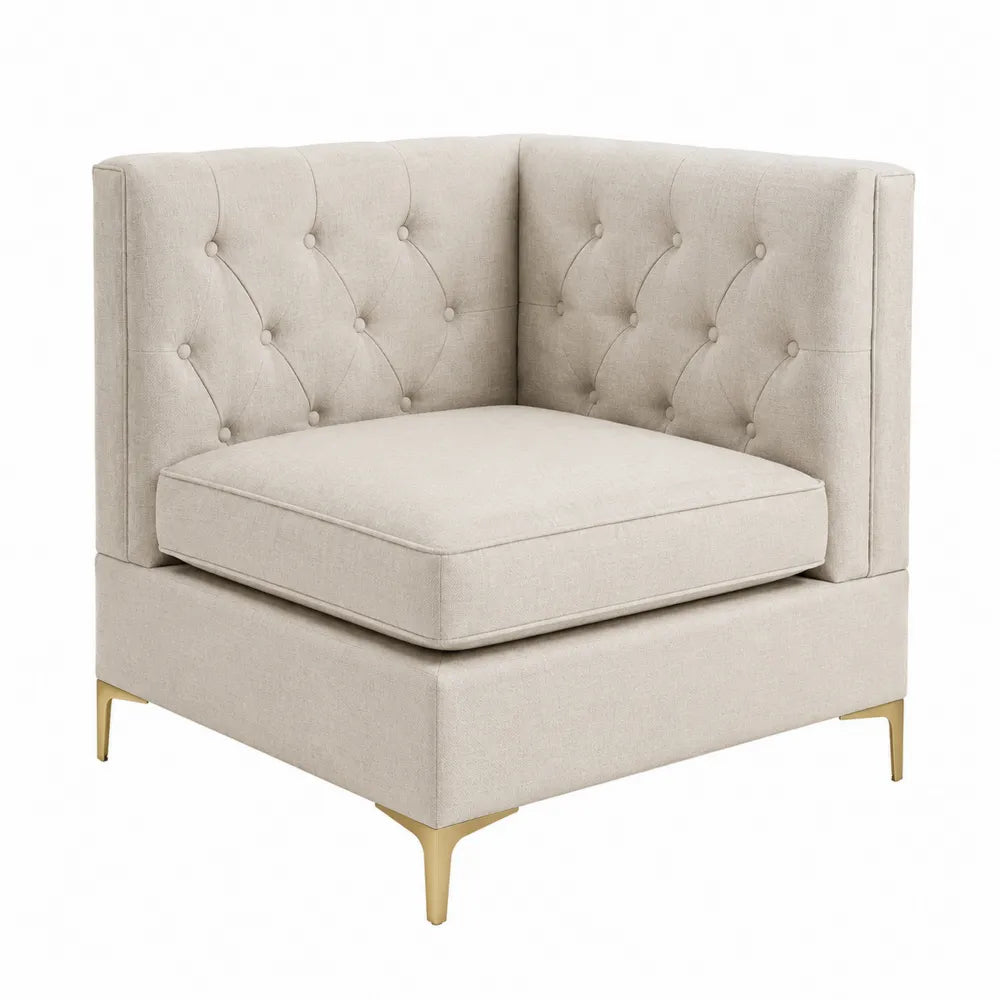 Sillón esquinero de lino beige con patas de metal